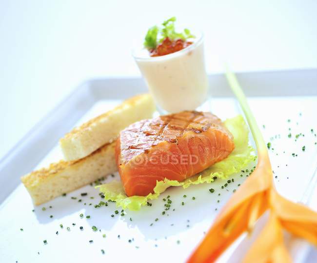 Marinated salmon with bread — Stock Photo