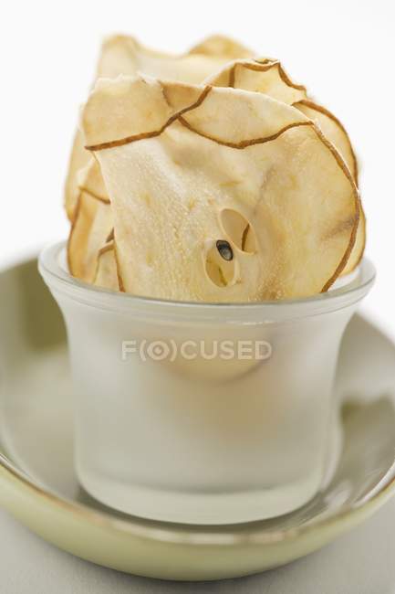 Dried pear slices in glass — Stock Photo
