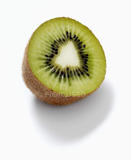 Half a kiwi fruit — Stock Photo