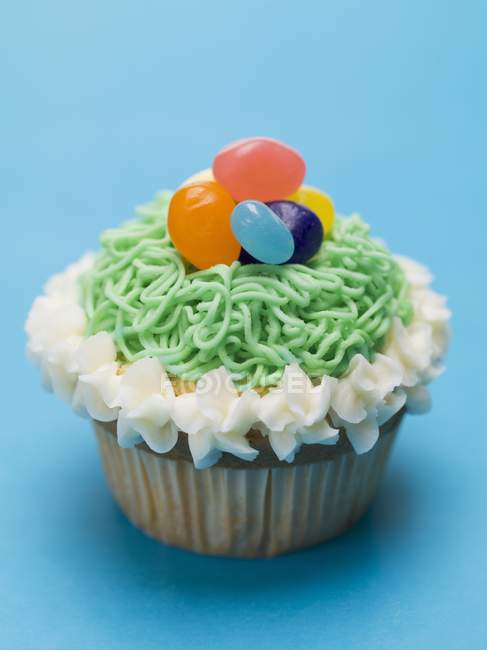 Cupcake with jelly beans — Stock Photo