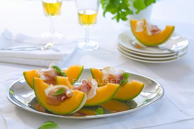 Melon with ham starters — Stock Photo