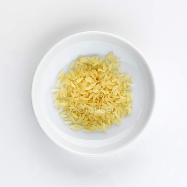 Plate of long grain rice — Stock Photo