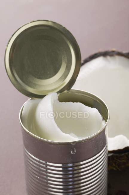 Coconut flesh in tin — Stock Photo