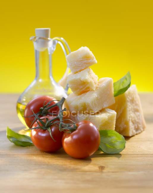 Tomatoes, basil, Parmesan — Stock Photo