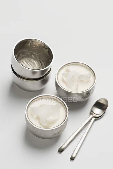 Coconut mousse in metal bowls — Stock Photo