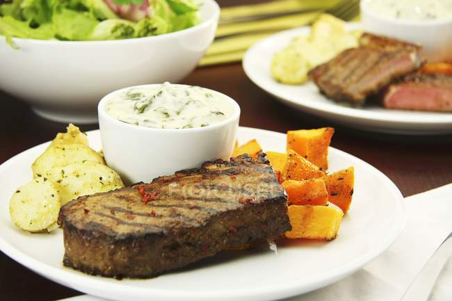 Beef steak with squash — Stock Photo