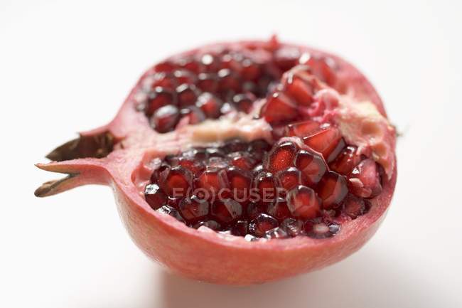 Half of fresh pomegranate — Stock Photo