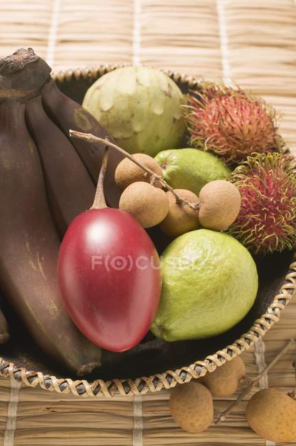 Basket of exotic fruits — Stock Photo