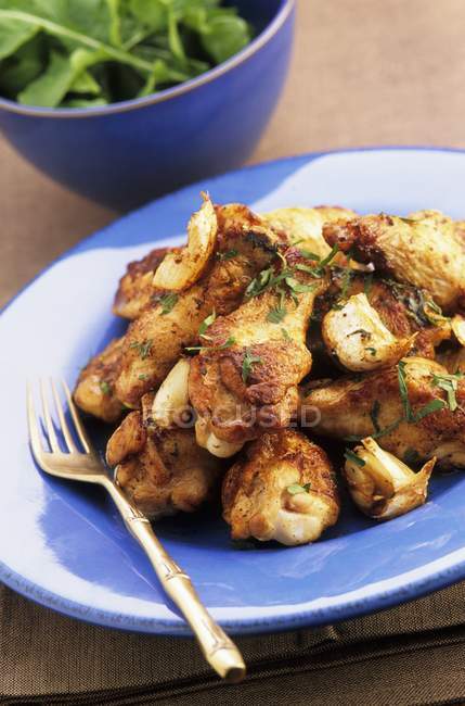 Roasted Chicken legs with garlic — Stock Photo