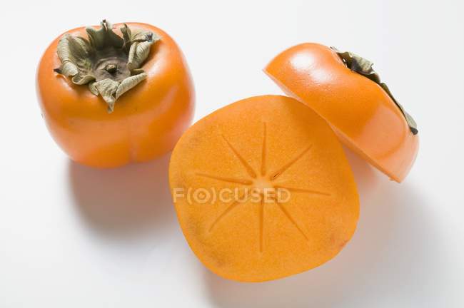 Fresh ripe persimmons — Stock Photo