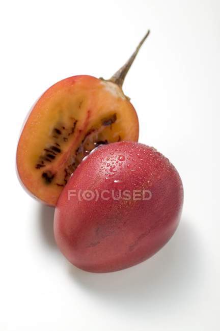 Tamarillo with drops of water — Stock Photo