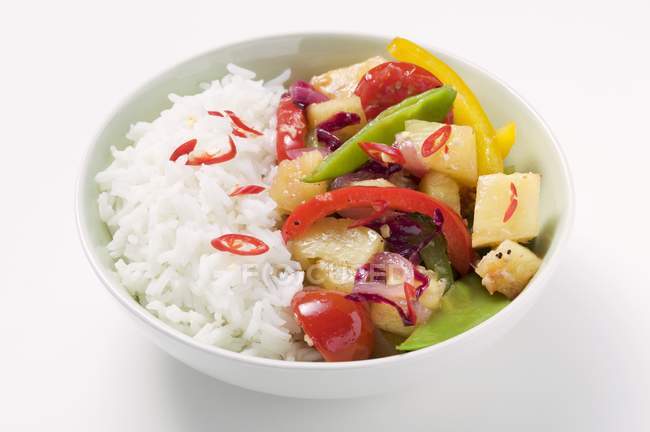 Fried vegetables with pineapple and rice — Stock Photo