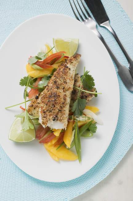 Spicy pangasius fillet with vegetables — Stock Photo
