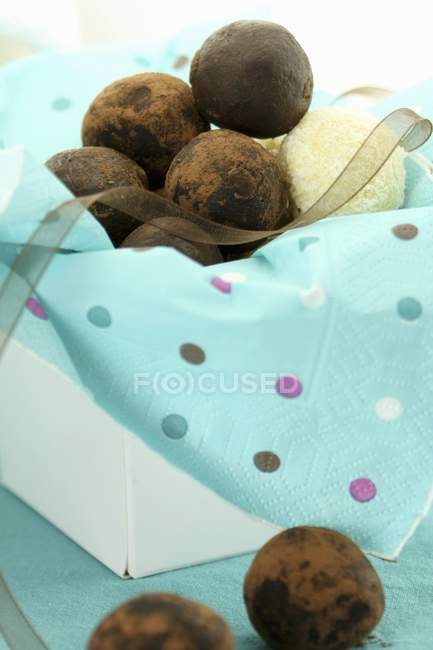 Truffle pralines in box — Stock Photo