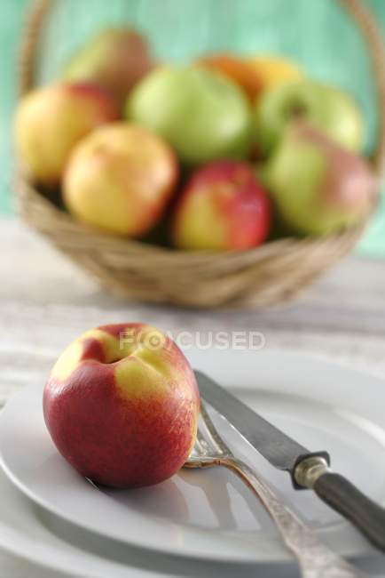 Plate with fork and knife — Stock Photo