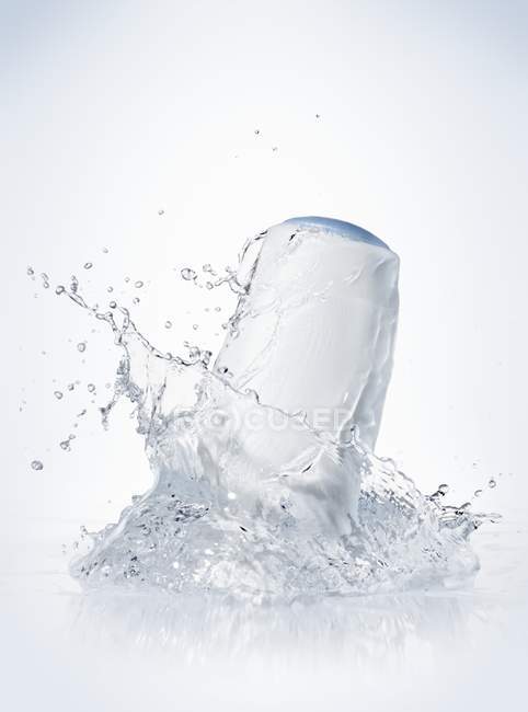 Closeup view of shower gel fallen in water with splash — Stock Photo