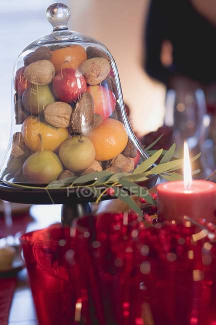 Fruits and nuts under dome — Stock Photo