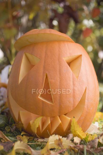 Carved pumpkin face — Stock Photo