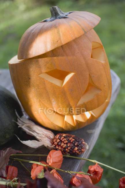 Carved pumpkin face — Stock Photo