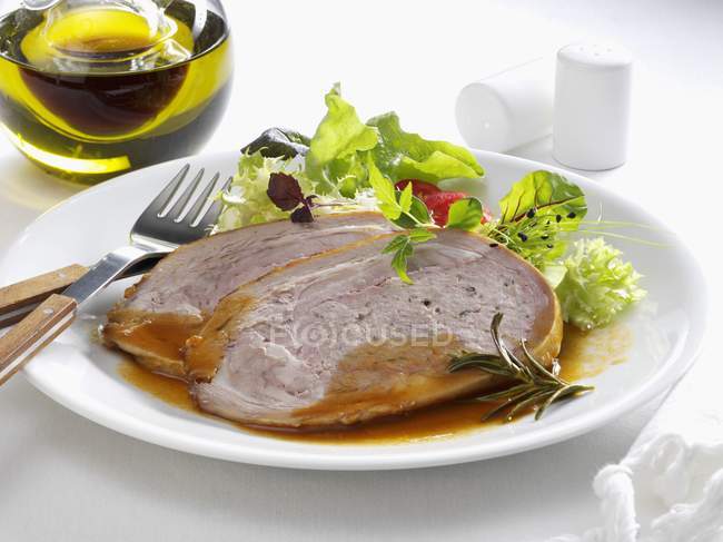 Veal with salad leaves — Stock Photo