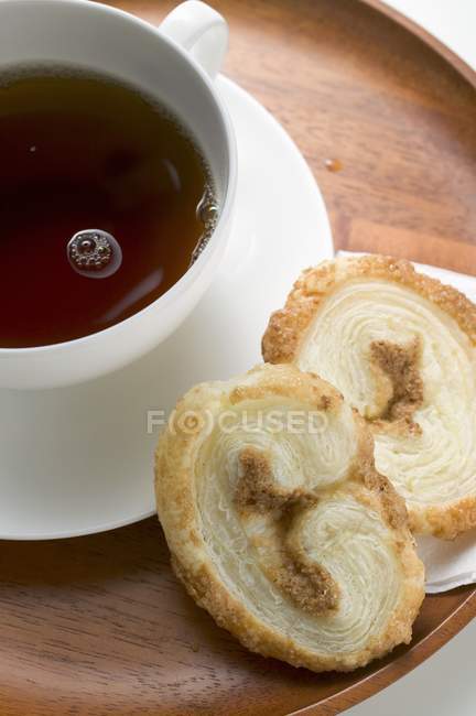 Biscuit and cup of coffee — Stock Photo
