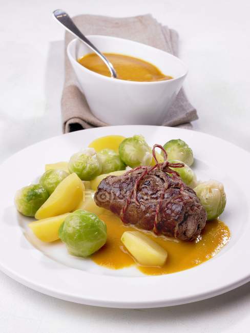 Beef roulade with sprouts — Stock Photo