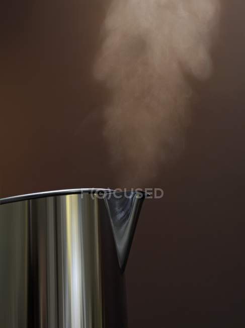 Steam rising from kettle — Stock Photo