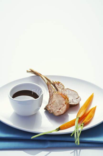 Lamb chops with carrots — Stock Photo