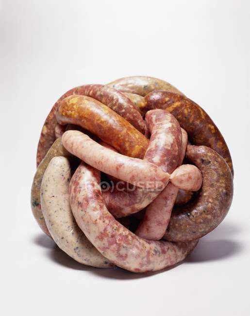 Raw Sausages in ball — Stock Photo