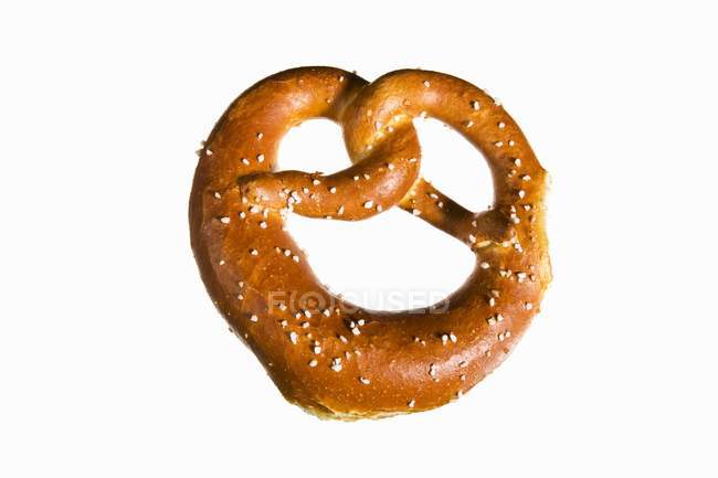 Salted pretzel on white background — Stock Photo