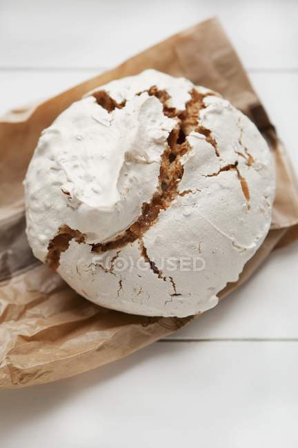 Meringue Cookie on a Brown Paper Bag — Stock Photo