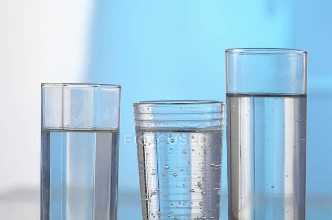 Três copos de água limpa — Fotografia de Stock