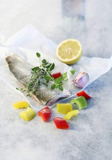 Steamed fish fillet with mixed peppers — Stock Photo