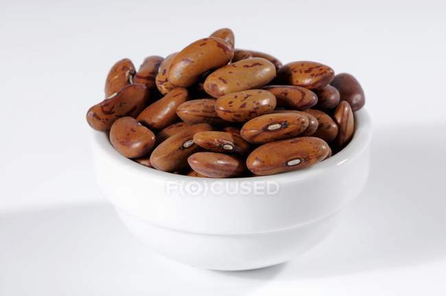 Borlotti beans in ceramic bowl — Stock Photo