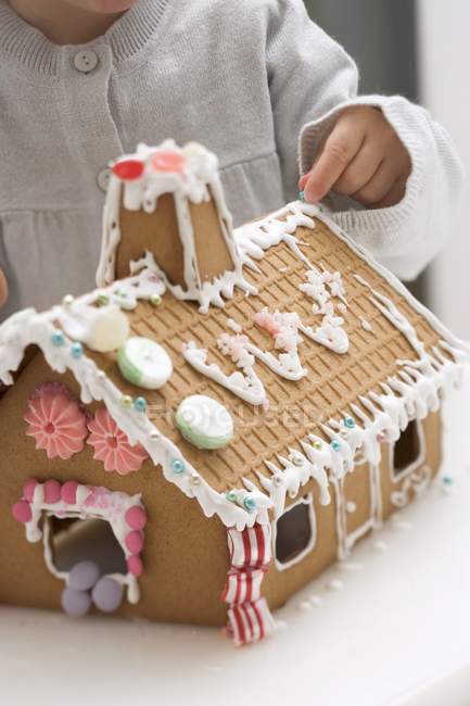 Gingerbread house with pearls — Stock Photo