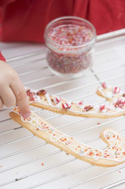 Christmas biscuits with sprinkles — Stock Photo