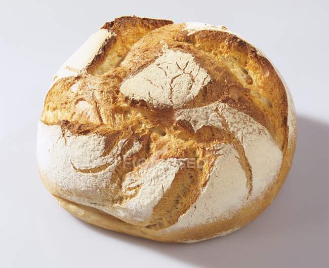 Round wheat bread — Stock Photo