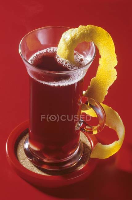 Fruit tea with orange peel — Stock Photo