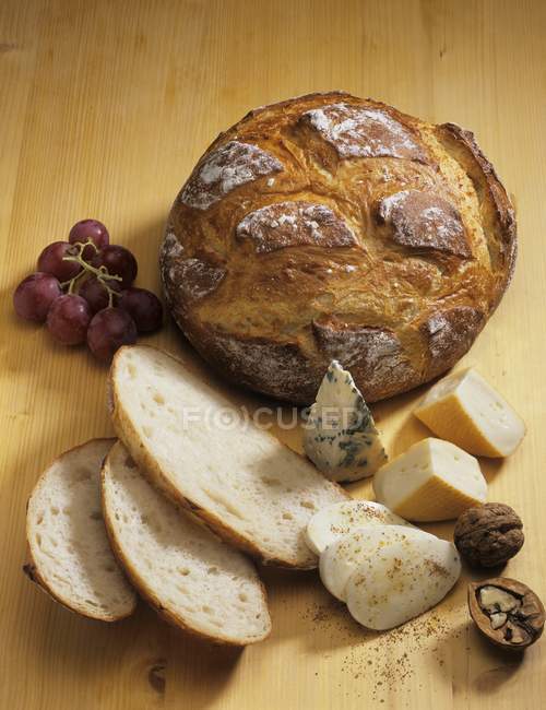 Bread on wooden surface — Stock Photo