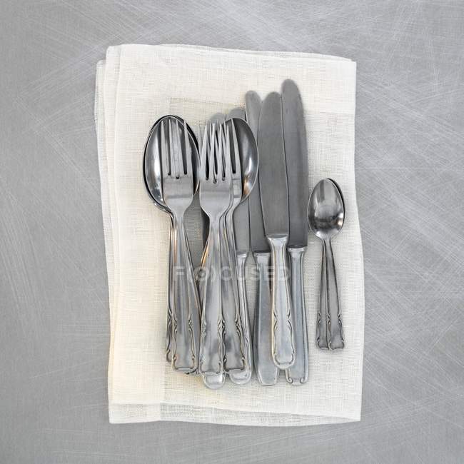 Top view of old cutlery on a napkin — Stock Photo