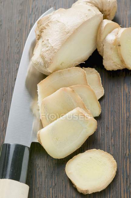 Partly sliced Ginger root — Stock Photo