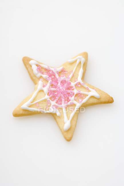 Biscuit decorated with pink sugar — Stock Photo