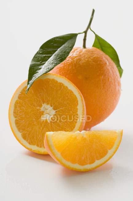 Orange with stalk and leaves — Stock Photo