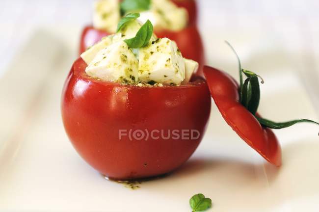 Tomato filled with cheese — Stock Photo