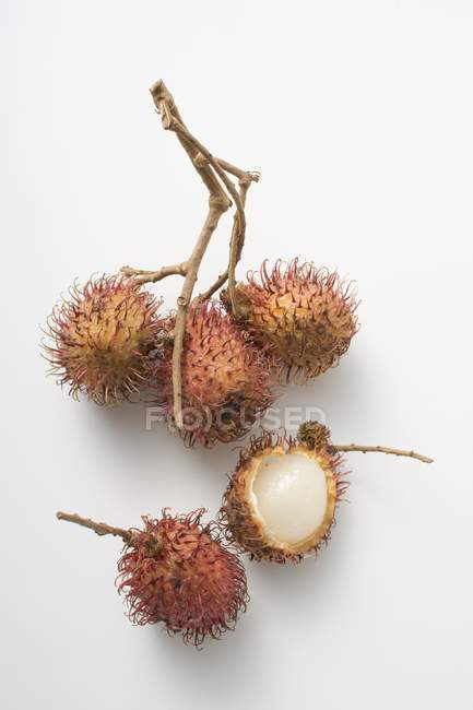 Cluster of fresh rambutans — Stock Photo