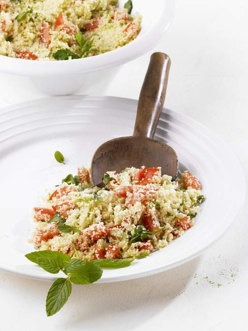 Couscous salad with tomato — Stock Photo