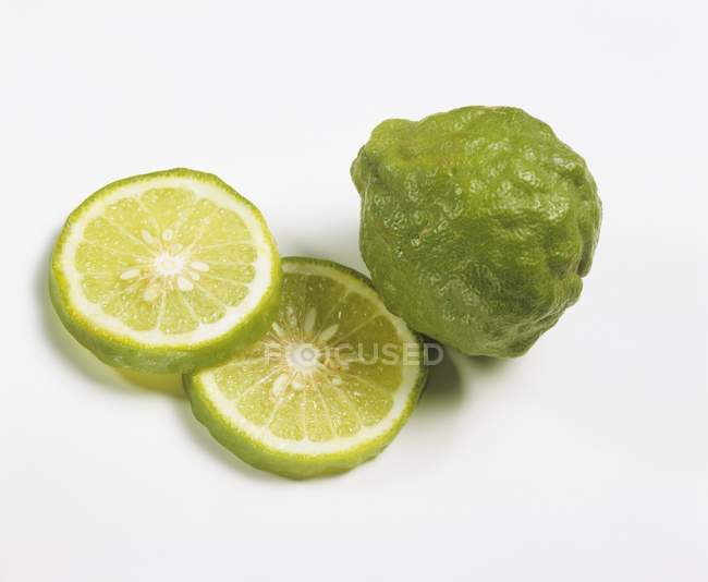 Kaffir whle lime with slices — Stock Photo