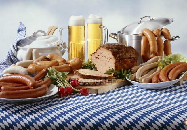 Bavarian sausages with beer — Stock Photo