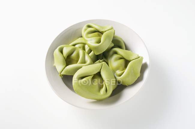Fresh spinach tortellini pasta — Stock Photo