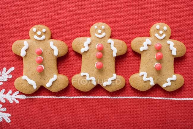 Three gingerbread men — Stock Photo